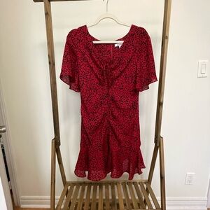 Red mini dress, adjustable drawstring through the middle